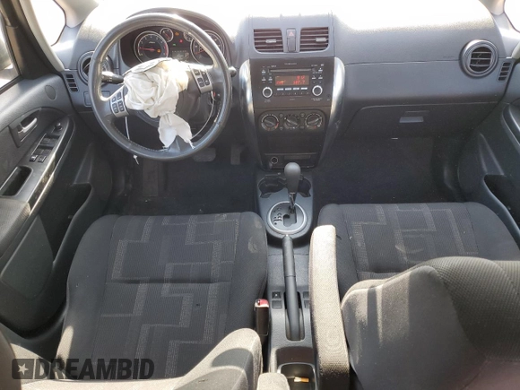 2012 Suzuki SX4 LE z VIN JS2YC5A34C6300969, wystawiony jako Copart lot #49036095 z przebiegiem 163 367 mil mil oraz Szkoda całkowita • Salvage title. Historia ofert i sprzedaży dostępna na DreamBid. Obrazek 8.