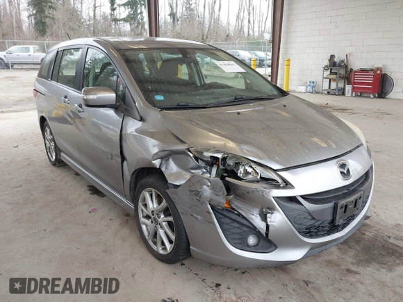 2014 Mazda 5 Touring with VIN JM1CW2CL6E0164146, listed as a IAAI auction lot 41458945 with 157,345 mi miles. Bid and sale history available at carsss.com. Image 1.