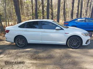 2020 Volkswagen Jetta GLI S with VIN 3VW6T7BUXLM038747, listed as a IAAI auction lot 41937087 with 71,831 mi miles and . Bid and sale history available at DreamBid. Image 13.