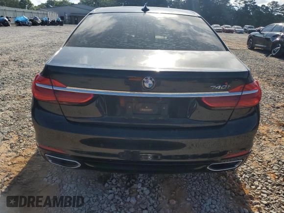 2017 BMW 7 Series 740i with VIN WBA7E2C57HG739482, listed as a Copart auction lot 53652145 with 102,418 mi miles and Salvage title. Bid and sale history available at DreamBid. Image 6.