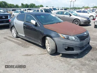 2015 Kia Optima EX with VIN 5XXGN4A79FG373483, listed as a IAAI auction lot 42514913 with 246,487 mi miles and . Bid and sale history available at DreamBid. Image 1.