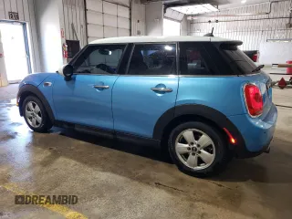 2017 MINI Hardtop 4 Door Cooper with VIN WMWXU1C58H2E17768, listed as a Copart auction lot 55128445 with 114,957 mi miles and Salvage Title. Bid and sale history available at DreamBid. Image 2.