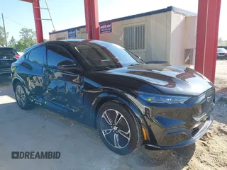 2023 Ford Mustang Mach-E Premium z VIN 3FMTK3R49PMA72364, wystawiony jako IAAI lot #41999783 z przebiegiem 15 023 mil mil oraz . Historia ofert i sprzedaży dostępna na DreamBid. Obrazek 6.
