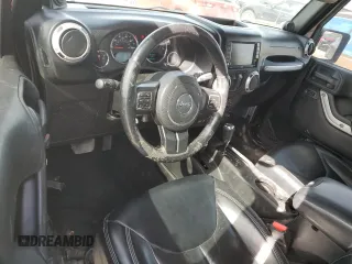2014 Jeep Wrangler Unlimited Sahara with VIN 1C4BJWEG1EL196129, listed as a Copart auction lot 53700115 with 140,998 mi miles and Clean Title. Bid and sale history available at carsss.com. Image 8.
