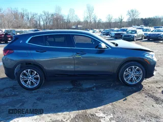 2022 BMW X2 xDrive28i z VIN WBXYJ1C05N5U40472, wystawiony jako IAAI lot #41433452 z przebiegiem 67 801 mil mil oraz . Historia ofert i sprzedaży dostępna na DreamBid. Obrazek 12.