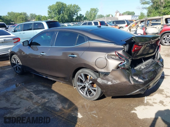 2016 Nissan Maxima Platinum z VIN 1N4AA6AP3GC385276, wystawiony jako IAAI lot #42547410 z przebiegiem 100 307 mil mil oraz . Historia ofert i sprzedaży dostępna na DreamBid. Obrazek 3.