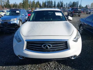 2014 Infiniti QX70 with VIN JN8CS1MW2EM411237, listed as a IAAI auction lot 42011806 with 148,133 mi miles and . Bid and sale history available at carsss.com. Image 12.