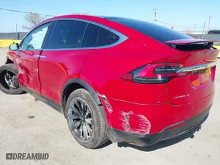 2016 Tesla Model X 70D with VIN 5YJXCAE27GF021994, listed as a IAAI auction lot 41976475 with 70,771 mi miles. Bid and sale history available at carsss.com. Image 3.