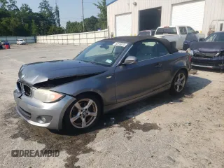2013 BMW 1 Series 128i with VIN WBAUL7C50DVU09856, listed as a Copart auction lot 62916024 with 114,529 mi miles and Salvage Title. Bid and sale history available at carsss.com. Image 1.