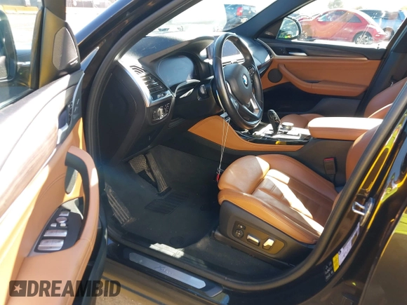 2020 BMW X4 xDrive30i z VIN 5UX2V1C05L9C41372, wystawiony jako IAAI lot #42316997 z przebiegiem 73 412 mil mil oraz . Historia ofert i sprzedaży dostępna na DreamBid. Obrazek 5.