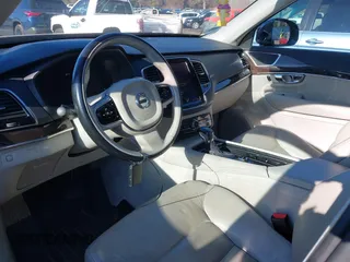2016 Volvo XC90 T6 Momentum with VIN YV4A22PK3G1021640, listed as a IAAI auction lot 41104482 with 128,315 mi miles and . Bid and sale history available at carsss.com. Image 5.