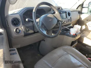 2010 Ford Econoline Passenger XL with VIN 1FMNE1BW6ADA87472, listed as a Copart auction lot 74989314 with 215,315 mi miles and Salvage Title. Bid and sale history available at DreamBid. Image 8.