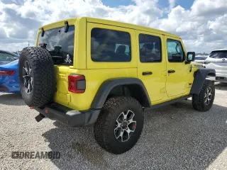 2022 Jeep Wrangler Unlimited Rubicon with VIN 1C4HJXFG3NW214174, listed as a Copart auction lot 74136484 with 5,292 mi miles and Salvage title. Bid and sale history available at DreamBid. Image 3.