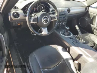 2010 Mazda MX-5 Miata Grand Touring with VIN JM1NC2FFXA0206089, listed as a Copart auction lot 76752674 with 212,584 mi miles and Salvage title. Bid and sale history available at DreamBid. Image 8.