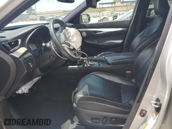 2019 Infiniti QX50 Luxe with VIN 3PCAJ5M10KF115123, listed as a Copart auction lot 57309395 with 122,978 mi miles and Salvage title. Bid and sale history available at DreamBid. Image 7.
