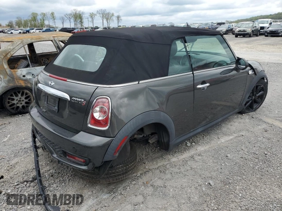 2012 MINI Convertible S with VIN WMWZP3C58CT296381, listed as a Copart auction lot 50834655 with 111,228 mi miles and Salvage Title. Bid and sale history available at DreamBid. Image 3.