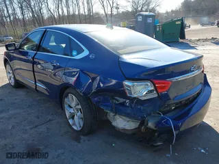 2014 Chevrolet Impala LTZ with VIN 1G1145SL1EU141133, listed as a IAAI auction lot 41698810 with 158,998 mi miles. Bid and sale history available at carsss.com. Image 3.