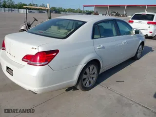 2006 Toyota Avalon XL with VIN 4T1BK36B46U102797, listed as a IAAI auction lot 42024722 with 256,717 mi miles. Bid and sale history available at carsss.com. Image 4.