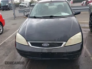 2005 Ford Focus S with VIN 1FAFP34N75W304479, listed as a IAAI auction lot 41117405 with 234,312 mi miles. Bid and sale history available at carsss.com. Image 12.