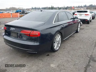 2017 Audi A8 L Sport with VIN WAU43AFD1HN007334, listed as a IAAI auction lot 41760035 with 67,342 mi miles. Bid and sale history available at carsss.com. Image 4.