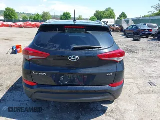 2016 Hyundai Tucson SE z VIN KM8J3CA47GU075162, wystawiony jako IAAI lot #42231685 z przebiegiem 177 038 mil mil oraz . Historia ofert i sprzedaży dostępna na DreamBid. Obrazek 16.