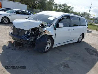 2015 Toyota Sienna SE with VIN 5TDXK3DC4FS678965, listed as a IAAI auction lot 40817635 with 147,027 mi miles. Bid and sale history available at carsss.com. Image 2.