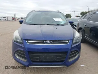 2016 Ford Escape Titanium with VIN 1FMCU0J97GUB96726, listed as a IAAI auction lot 41322229 with 119,237 mi miles. Bid and sale history available at carsss.com. Image 12.