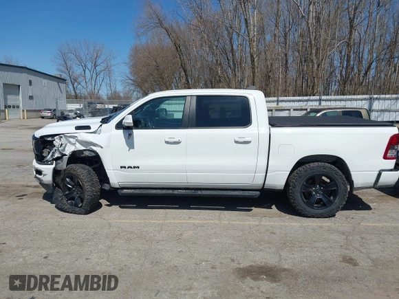 2020 Ram 1500 Big Horn with VIN 1C6SRFFT1LN103090, listed as a IAAI auction lot 41919577 with 70,429 mi miles and . Bid and sale history available at DreamBid. Image 13.