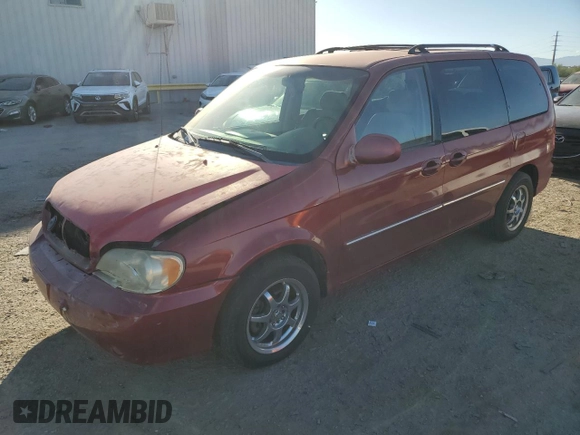 2005 Kia Sedona LX with VIN KNDUP132156669009, listed as a Copart auction lot 76936094 with 124,989 mi miles and Salvage Title. Bid and sale history available at carsss.com. Image 1.