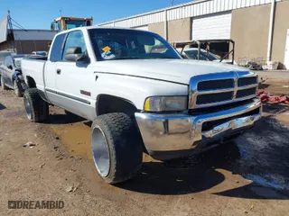 1999 Dodge Ram 2500 with VIN 1B7KF2362XJ653193, listed as a IAAI auction lot 37230531 with 328,209 mi miles. Bid and sale history available at carsss.com. Image 1.