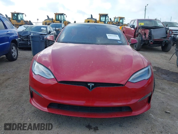 2021 Tesla Model S Plaid with VIN 5YJSA1E60MF447203, listed as a IAAI auction lot 42025120 with 58,190 mi miles. Bid and sale history available at carsss.com. Image 12.