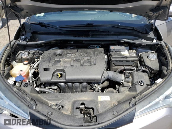 2018 Toyota C-HR XLE z VIN NMTKHMBX8JR001011, wystawiony jako Copart lot #55469265 z przebiegiem 106 938 mil mil oraz Szkoda całkowita • Salvage title. Historia ofert i sprzedaży dostępna na DreamBid. Obrazek 11.