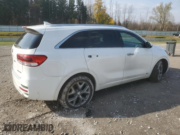 2016 Kia Sorento SXL z VIN 5XYPKDA16GG102852, wystawiony jako Copart lot #75659454 z przebiegiem Nie podano mil oraz Nie do naprawy • Non repairable. Historia ofert i sprzedaży dostępna na DreamBid. Obrazek 3.