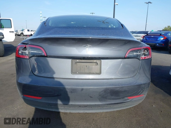 2023 Tesla Model 3 with VIN 5YJ3E1EA4PF427022, listed as a IAAI auction lot 42465964 with 169,346 mi miles and . Bid and sale history available at DreamBid. Image 16.