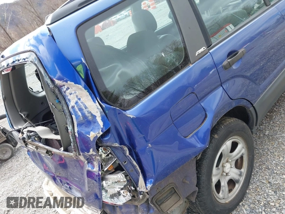 2003 Subaru Forester X with VIN JF1SG63683G737889, listed as a IAAI auction lot 41813431 with 132,196 mi miles. Bid and sale history available at carsss.com. Image 20.