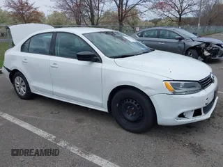 2014 Volkswagen Jetta Sedan S with VIN 3VW2K7AJ5EM329328, listed as a IAAI auction lot 41995084 with 72,409 mi miles. Bid and sale history available at carsss.com. Image 1.
