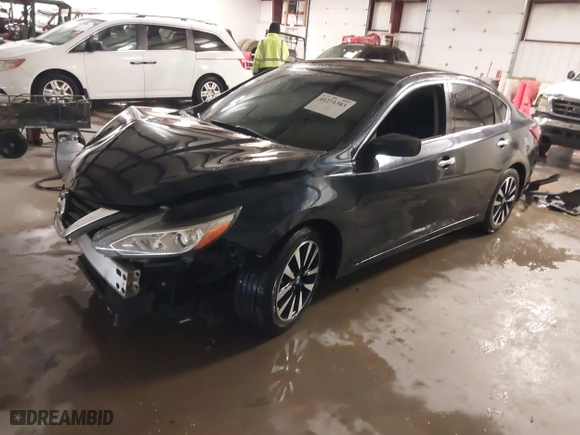 2018 Nissan Altima 2.5 SV with VIN 1N4AL3AP1JC276024, listed as a IAAI auction lot 41271383 with 121,088 mi miles. Bid and sale history available at carsss.com. Image 18.