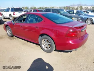 2004 Pontiac Grand Prix GT2 with VIN 2G2WS522141217359, listed as a IAAI auction lot 41677677 with 121,581 mi miles. Bid and sale history available at carsss.com. Image 3.