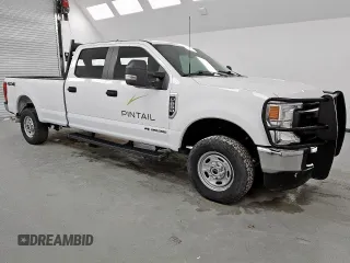 2022 Ford F-250 XL with VIN 1FT7W2BT3NEC38239, listed as a Copart auction lot 63423635 with 104,967 mi miles and Clean title. Bid and sale history available at DreamBid. Image 4.