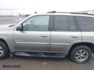 2006 GMC Envoy SLE with VIN 1GKDT13S862232455, listed as a IAAI auction lot 41483418 with 198,267 mi miles. Bid and sale history available at carsss.com. Image 14.
