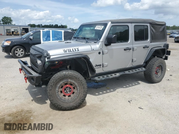 2020 Jeep Wrangler Unlimited Willys z VIN 1C4HJXDG5LW216718, wystawiony jako Copart lot #53144705 z przebiegiem 27 932 mil mil oraz Czysty tytuł • Clean title. Historia ofert i sprzedaży dostępna na DreamBid. Obrazek 1.