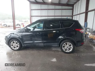 2017 Ford Escape SE with VIN 1FMCU0GD8HUB77633, listed as a IAAI auction lot 42158359 with 111,190 mi miles and . Bid and sale history available at DreamBid. Image 14.