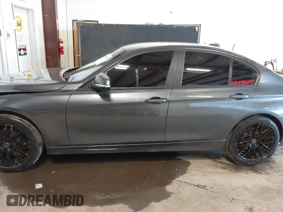 2015 BMW 3 Series 328i xDrive with VIN WBA3B5G53FNS17413, listed as a IAAI auction lot 41643479 with 99,065 mi miles. Bid and sale history available at carsss.com. Image 14.