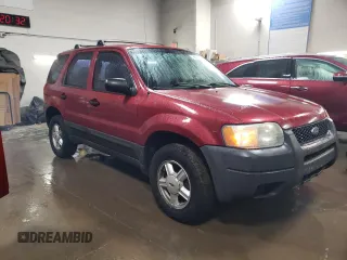 2004 Ford Escape XLS with VIN 1FMYU021X4DA05312, listed as a Copart auction lot 86185954 with 186,010 mi miles and Salvage Title. Bid and sale history available at DreamBid. Image 4.