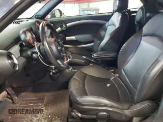 2012 MINI Coupe S z VIN WMWSX3C50CT154835, wystawiony jako Copart lot #76659984 z przebiegiem 122 425 mil mil oraz Szkody całkowita. Historia ofert i sprzedaży dostępna na DreamBid. Obrazek 7.