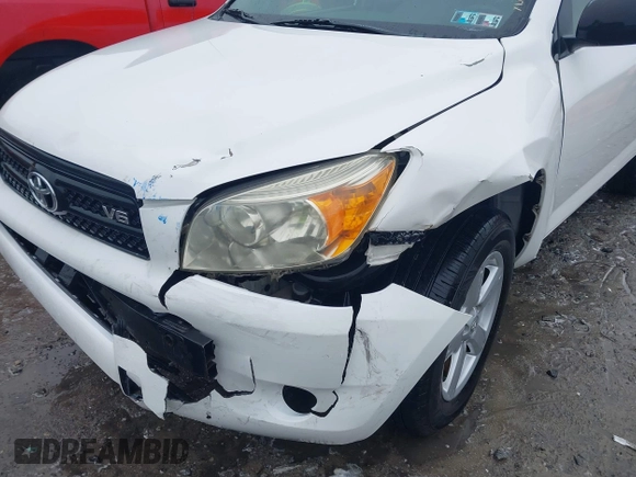 2007 Toyota RAV4 with VIN JTMBK33V976014286, listed as a IAAI auction lot 41568927 with 121,791 mi miles. Bid and sale history available at carsss.com. Image 6.