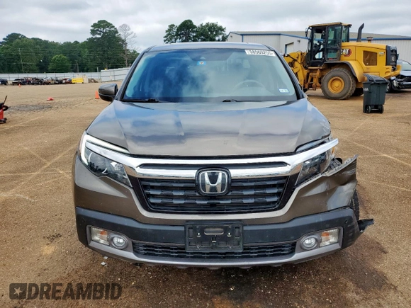 2020 Honda Ridgeline RTL-E with VIN 5FPYK3F79LB001891, listed as a Copart auction lot 58569255 with 34,513 mi miles and Salvage title. Bid and sale history available at DreamBid. Image 5.