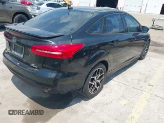 2015 Ford Focus SE with VIN 1FADP3F21FL280550, listed as a IAAI auction lot 42200104 with 146,175 mi miles and . Bid and sale history available at DreamBid. Image 4.