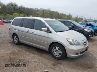2007 Honda Odyssey EX-L z VIN 5FNRL38677B451060, wystawiony jako IAAI lot #42161554 z przebiegiem 190 147 mil mil oraz . Historia ofert i sprzedaży dostępna na DreamBid. Obrazek 1.