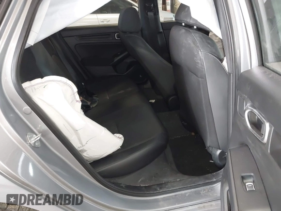 2023 Honda Civic Sport with VIN 19XFL2H80PE010679, listed as a IAAI auction lot 42026973 with 25,701 mi miles and . Bid and sale history available at DreamBid. Image 8.